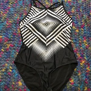One piece strapped back suit